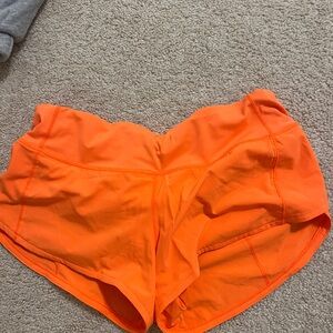 Lululemon Orange 2.5” speed up shorts